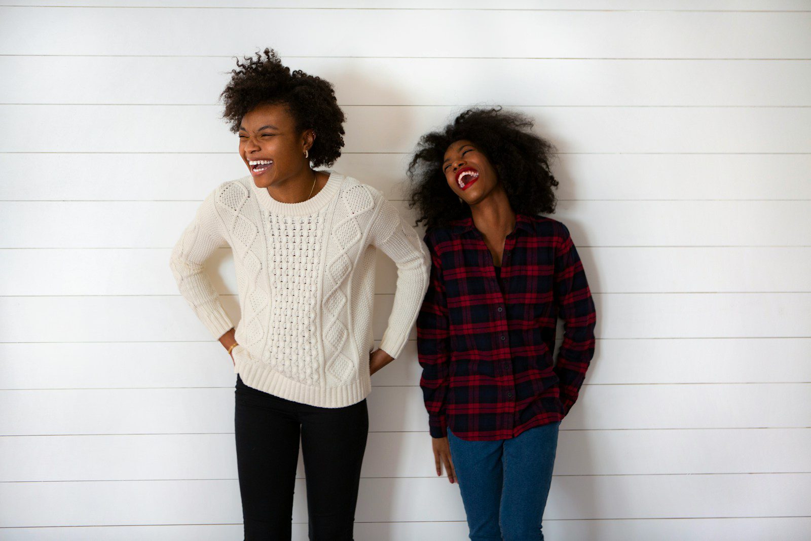 two woman smiling